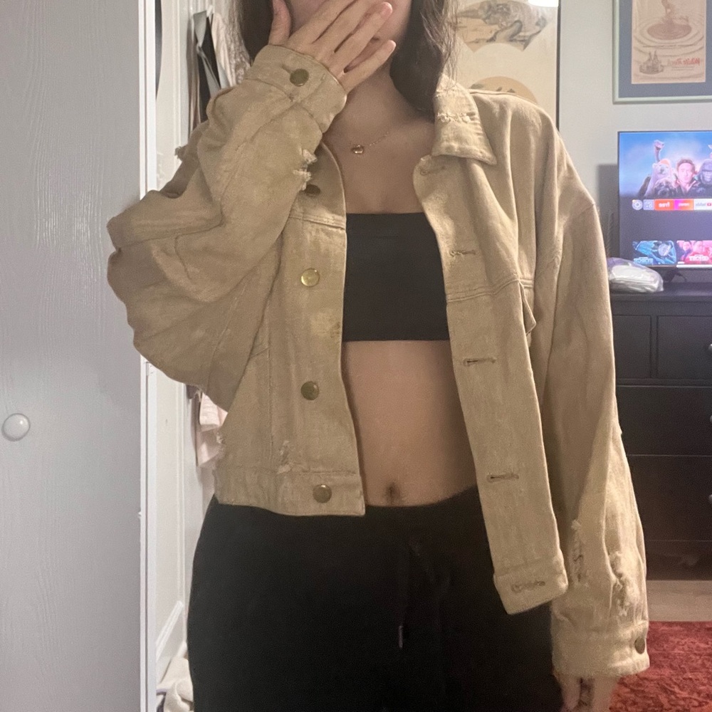 Tan distressed denim jacket